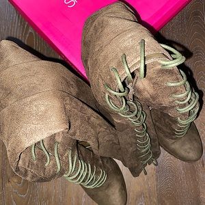 Thigh high combat boots